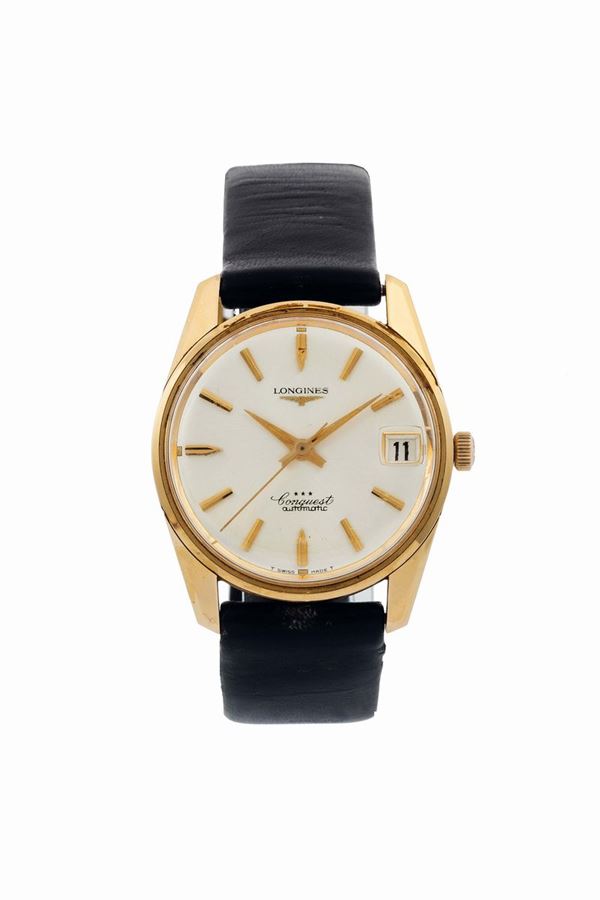 Longines, Conquest, Automatic,   Ref. 9048. Fine, center seconds, water resistant, self-winding, 18K yellow gold wristwatch with date. Accompanied by the original box and Guarantee. Made circa 1960
