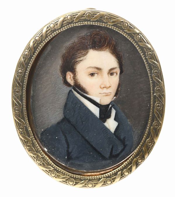 Miniatura su avorio raffigurante gentiluomo in giacca blu, inizi XIX secolo