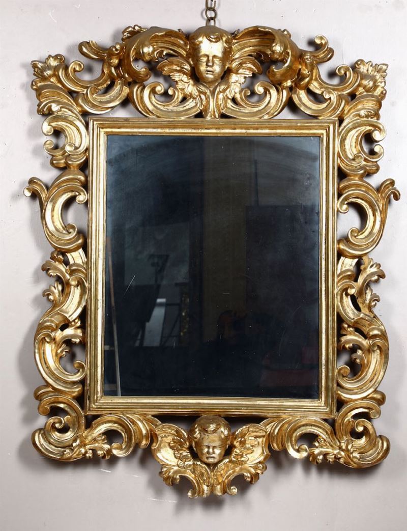 Specchiera in legno intagliato e dorato, XIX secolo  - Asta Antiquariato - I - Cambi Casa d'Aste