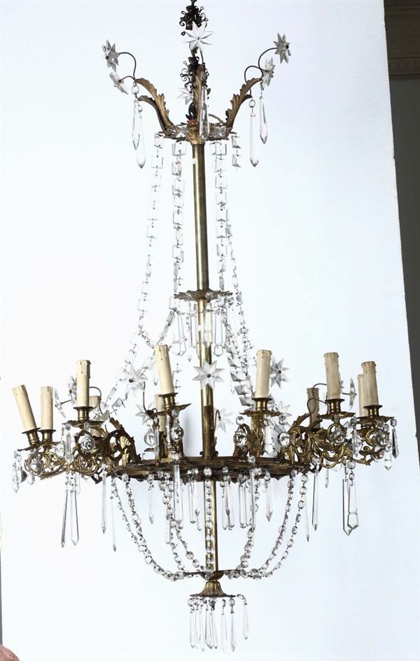 Grande lampadario Liberty in bronzo dorato a 12 luci