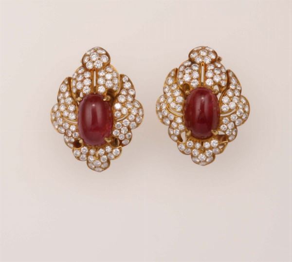 Pair of ruby and diamond earrings. Signed Bulgari. Fitted case