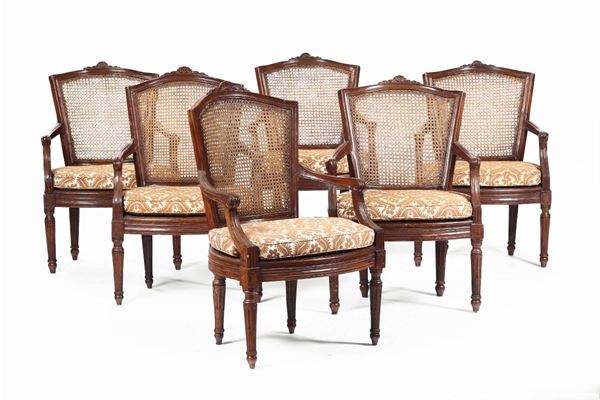 Sei poltrone Luigi XVI in noce intagliato, Genova, fine XVIII secolo