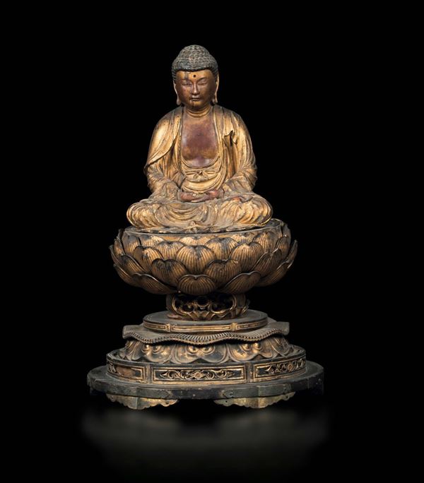 A gilt and lacquered wood figure of Buddha seated on a lotus flower, Japan, Edo period, 17th-18th century