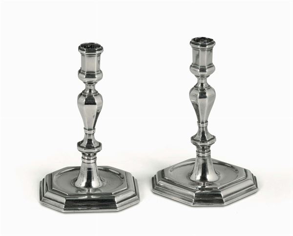 A pair of molten and engraved silver candle holders. Genoa, Torretta punch for the year 1734