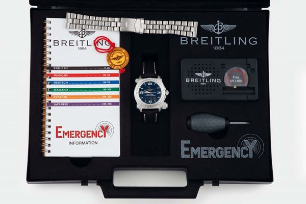 Breitling, Genève, Emergency, Chronometre, Ref. E76321. Fine and unusual, water-resistant, titanium aviator's quartz Chronometer wristwatch with digital display for the chronograph, perpetual calendar with date, day, month and year, world time indication, alarm, micro antenna with aviation emergency frequency 121.5 MHz with an original steel buckle.  Accompanied by the original box, additional titanium bracelet, papers, Guarantee, overhaul document, Certificate, instruction booklet and tools. Sold in 2005