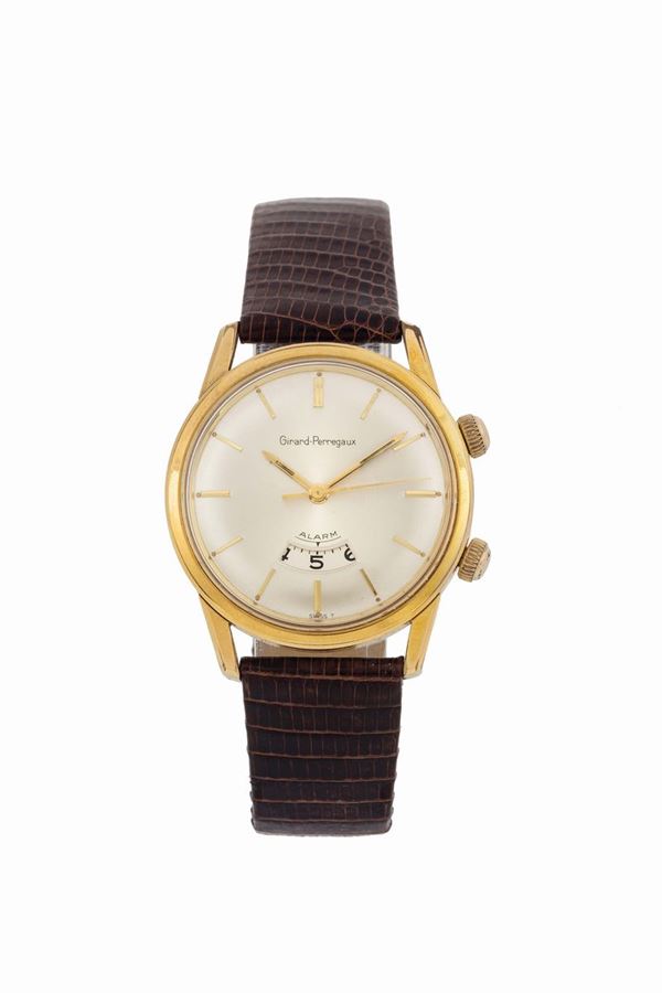 Girard Perregaux, Alarm, stainless steel and gold plated wristwatch with alarm. Made circa 1960