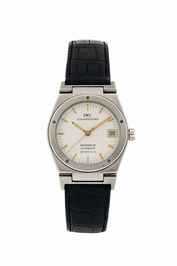 IWC, Ingenieur International Watch & Co., (IWC), Schaffhausen,  Automatic, 500.000 A/m , Ref. 3518. Fine and very rare, tonneau shaped, water resistant, self winding, center seconds, antimagnetic, 18K white gold wristwatch with an 18K white gold IWC buckle. Accompanied by the original box, hang tag, Guarantee and instruction booklet. Made in a limited edition of 25 examples in 1990.