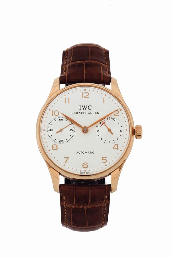 IWC, PORTUGIESER, REF. 5000, No. 464/750, 18K pink gold, self winding wristwatch with power reserve and an original gold buckle. Made in a limited edition of 750 pieces. Accompanied by the original box and Guarantee.