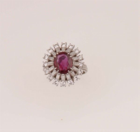 Anello con rubino Burma di ct 1,80 circa e diamanti taglio baguette e brillante a contorno