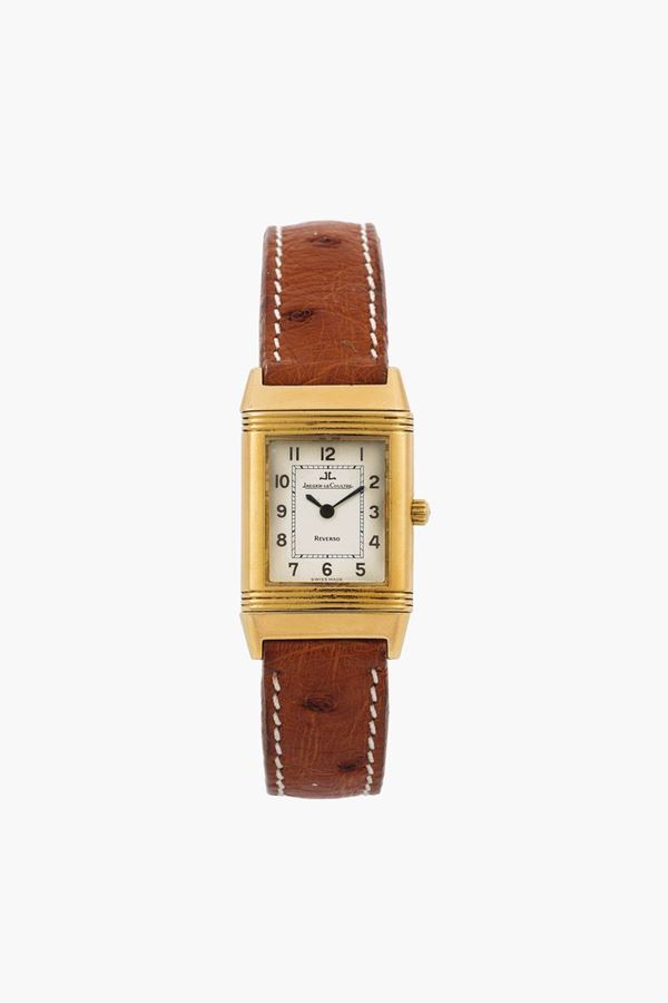 Jaeger LeCoultre, Reverso, Ref. 260108. Fine, reversible, 18K yellow gold, lady's quartz wristwatch. Accompanied by the original box, instruction booklet and Guarantee. Made circa 1990