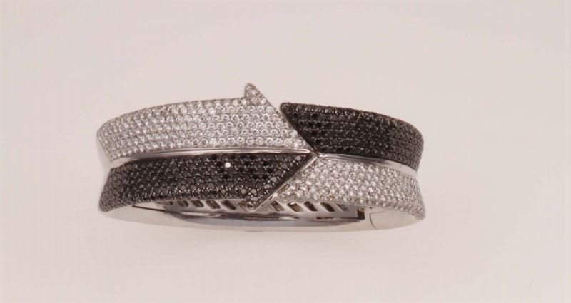 Diamond and gold bangle. Signed Enigma  - Auction Fine Jewels - Cambi Casa d'Aste