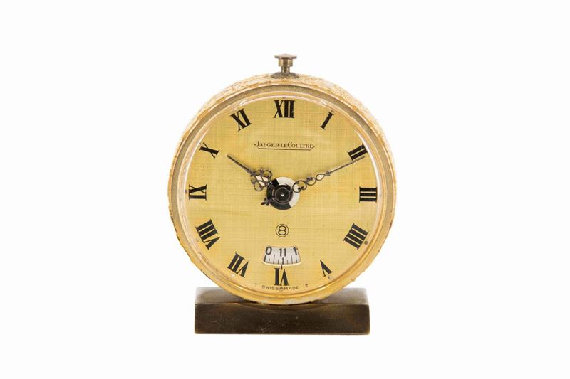 Jaeger Le Coultre, piccolo orologio da tavolo, in ottone dorato, con sveglia. Realizzato nel 1950 circa  - Asta Vintage, Gioielli e Orologi - Cambi Casa d'Aste