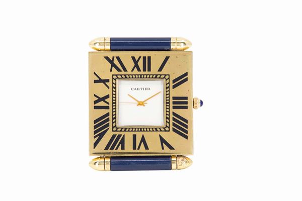 CARTIER, piccolo orologio da tavolo, in ottone dorato, al quarzo,  stile Art Deco. Realizzato nel 1980