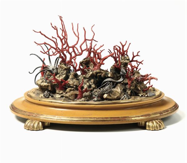 Coppia di centrotavola raffiguranti fondo marino in bronzo dorato con animali in argento, coralli e  [..]