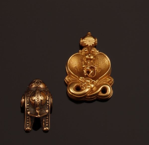 Two gold pendants