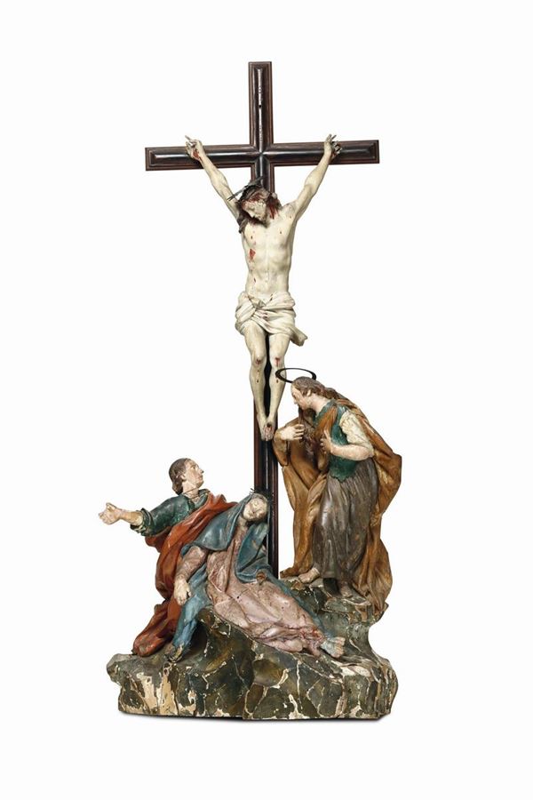 A crucifixion group in polychrome wood. Italian Baroque sculptor from the 18th century