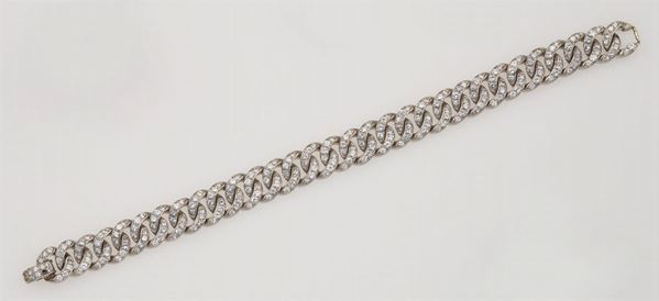 A platinum gourmette link bracelet set with brilliant-cut diamonds