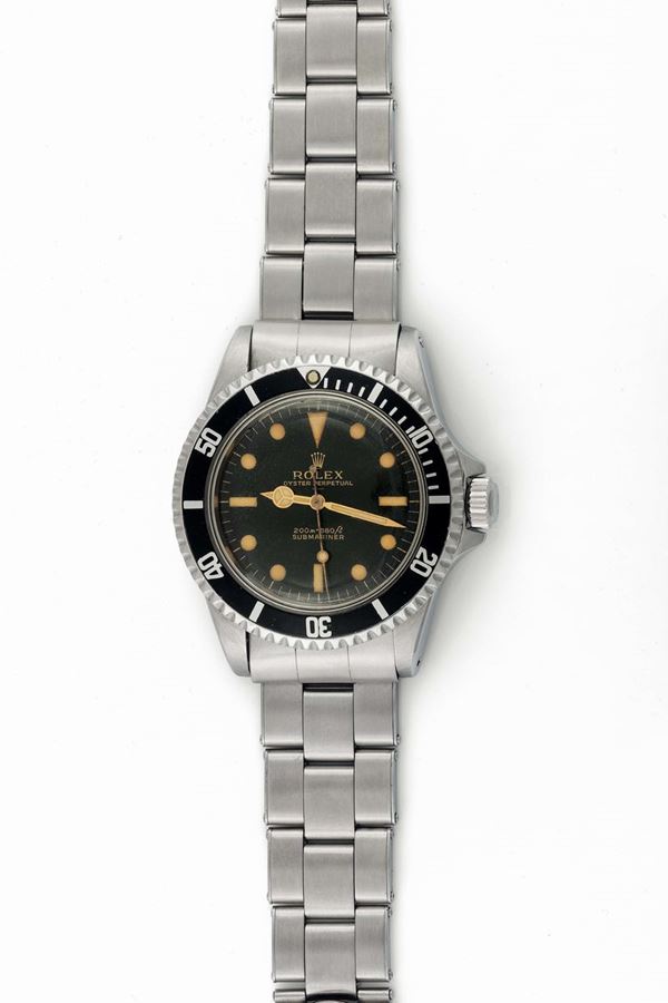 Rolex, Oyster Perpetual, Submariner, UPPER LINE METER FIRST, 200m = 660ft, case No. 1004629, Ref. 5513.  Fine and rare, center seconds, self-winding, water-resistant, stainless steel wristwatch with a Rolex Oyster riveted bracelet. Made circa 1964. Accompanied by the original box