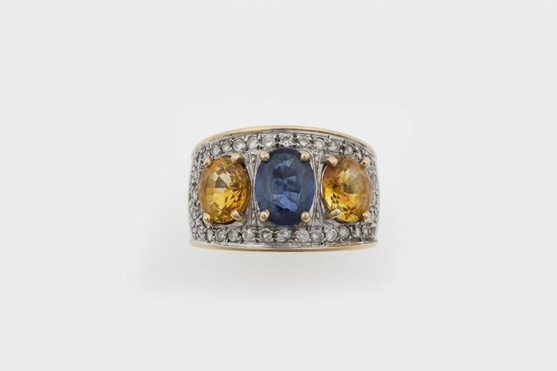 Anello a fascia con zaffiro, corindoni gialli e pavé di diamanti  - Auction Vintage, Jewels and Watches - Cambi Casa d'Aste