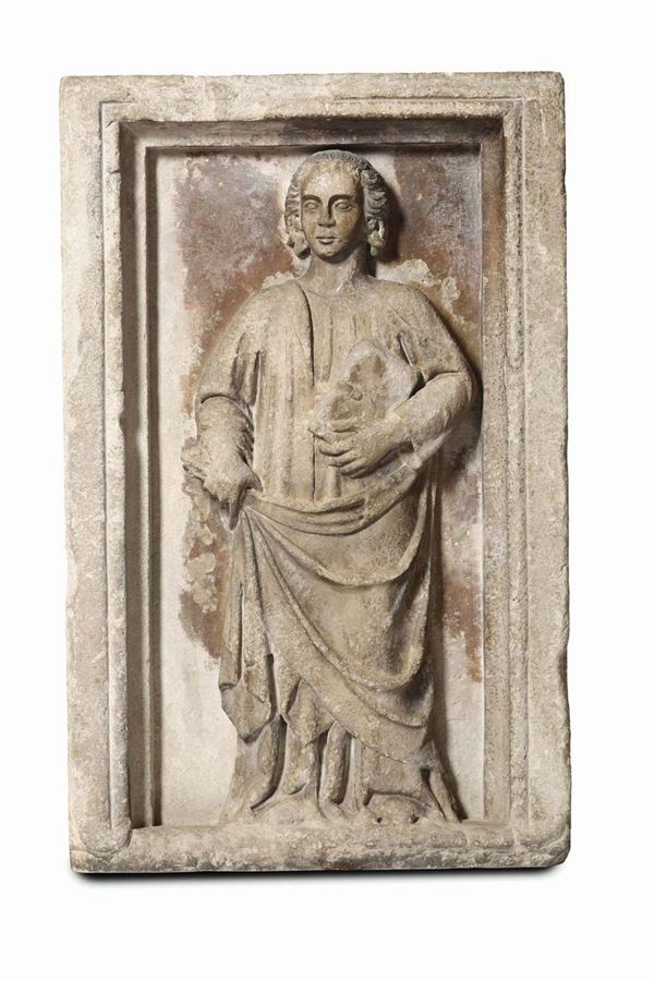 A stone bas-relief depicting an Apostle holding a book (Saint John?). Sculptor active in Southern Italy in the first half of the 14th century, close to Tino da Camaino (Pacio Bertini?)