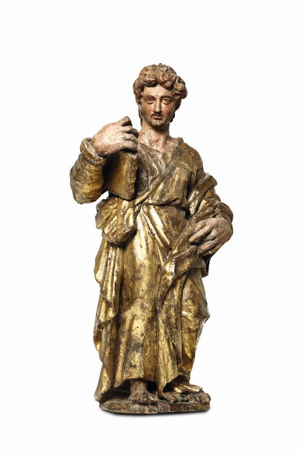 An Evangelist Saint in polychrome and gilded wood. Sculptor close to Alonso Berruguete, Spain, 16th century