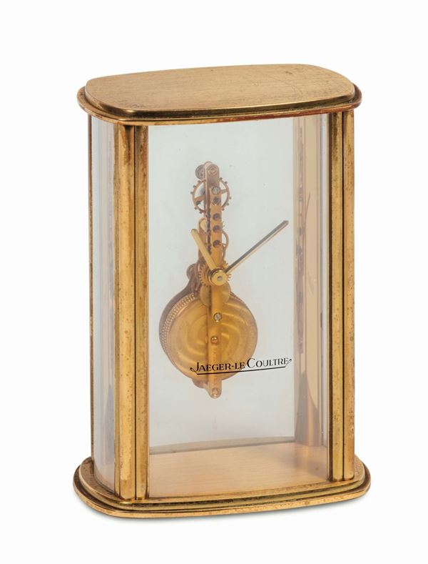 Jaeger LeCoultre, Baguette. Fine, gilt brass and glass, table clock. Made circa 1960