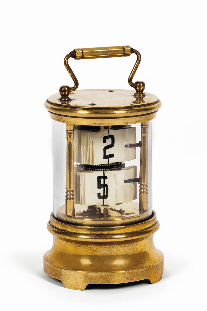 Unsigned. Unusual, gilt brass table clock with turning numbers. Made circa 1940  - Auction Watches and Pocket Watches - Cambi Casa d'Aste