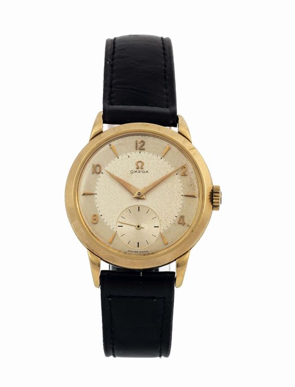 Omega. Fine, 14K yellow gold wristwatch with original gold plated buckle. Acompanied by the original box. Made circa 1950