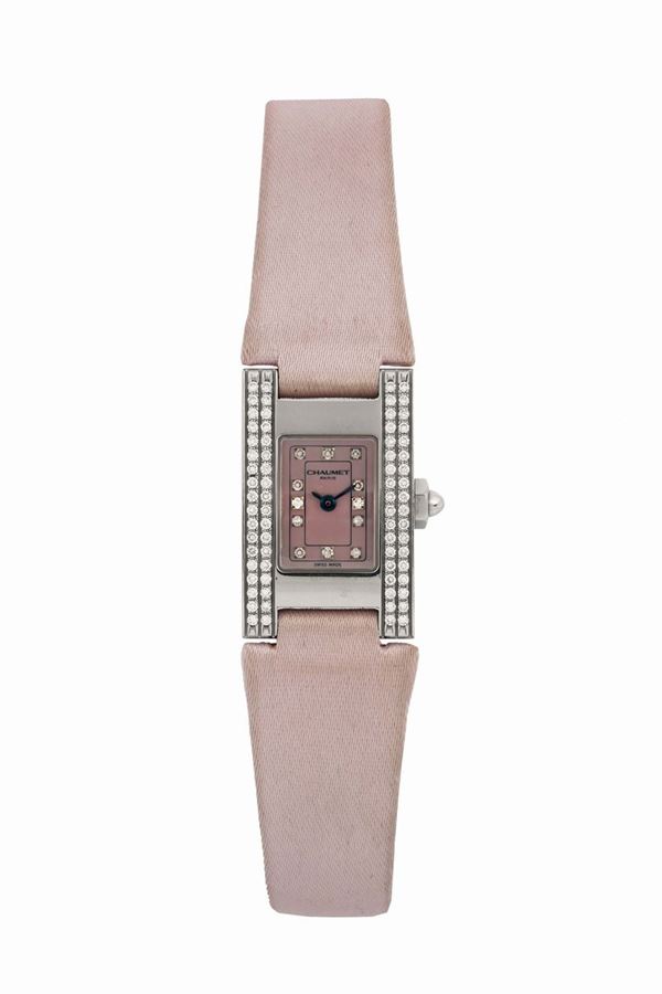 Chaumet, Paris. Fine, rectangular, water resistant, stainless steel and diamond lady 's quartz wristwatch with a steel Chaumet buckle. Made circa 1990