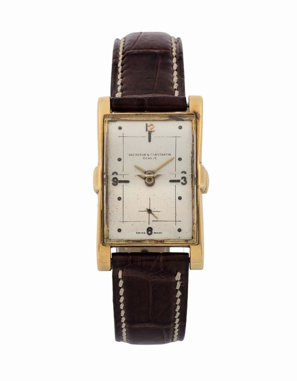 Vacheron & Constantin, Genève, Tegolino,movement No.  case No. 328253.  Very fine and rare, rectangular, flared, 18K yellow  gold wristwatch. Made circa 1950.