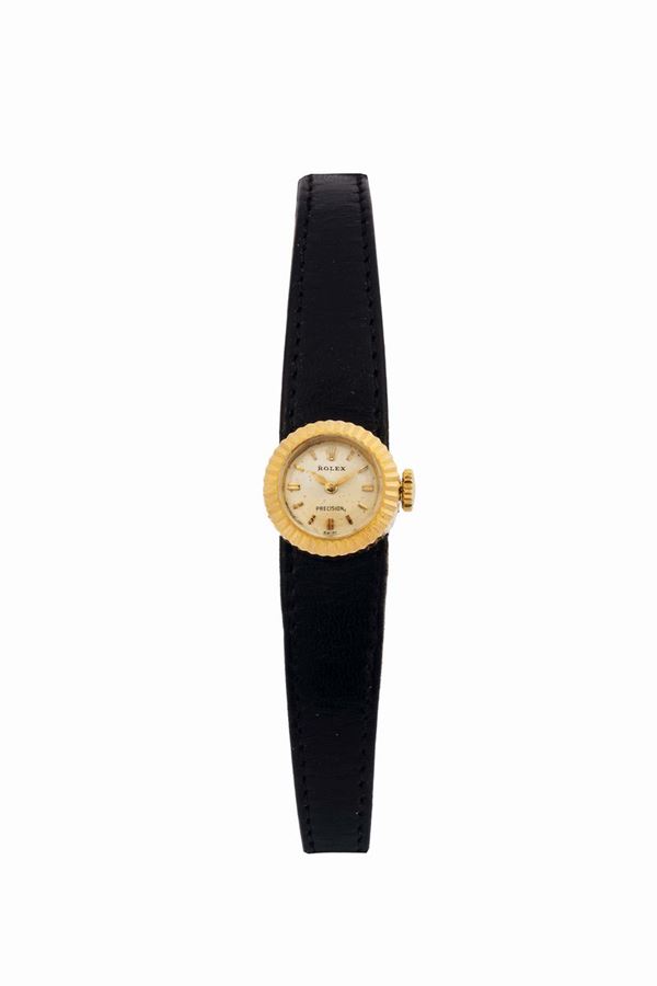 Rolex, Camaleon, case No. 595605. An unusual 18K yellow gold lady wristwatch with Rolex original buckle. Acompanied by the original box straps with original buckles. Made circa 1950