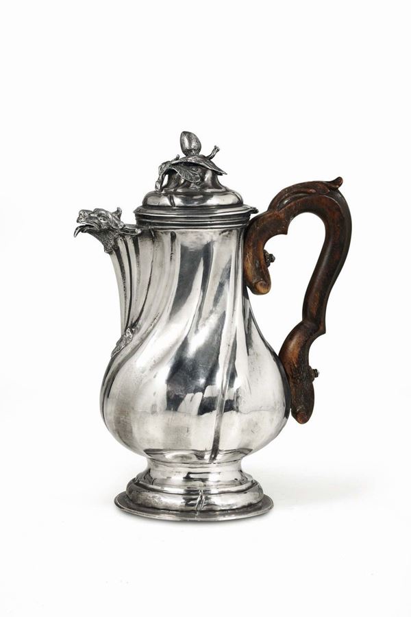 A molten, embossed and chiselled silver coffee pot, Milan, last quarter of the 18th century. Unidentified silversmith's stamp