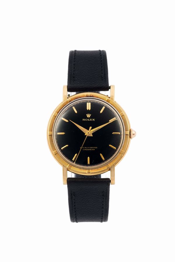 ROLEX, Officially Certified Chronometer, BLACK DIAL, Ref. 4448. Fine, 18K yellow gold wristwatch with gold plated Rolex buckle. Made in the 1950's