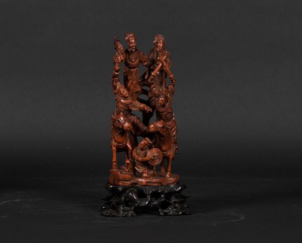A carved fruitwood group depicting knights and dignitaries, China, Qing Dynasty, 19th century