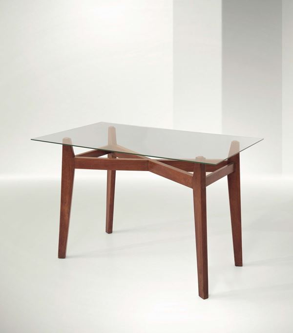 Franco Albini, a desk with a wooden structure and glass top. Original Vitrex mark. Original design for Casa C. Milano. Certificate of authenticity. Italy, 1945