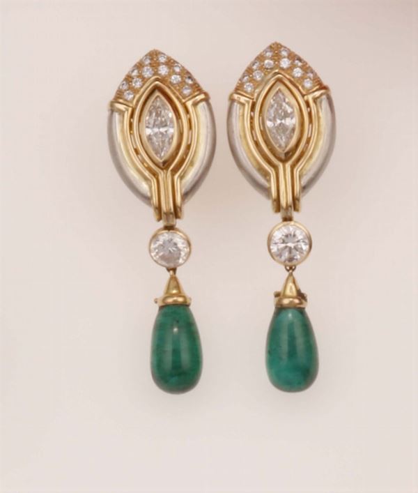 Pair of emerald, diamond, platinum and gold pendent earrings. Signed Bulgari. Fitted case