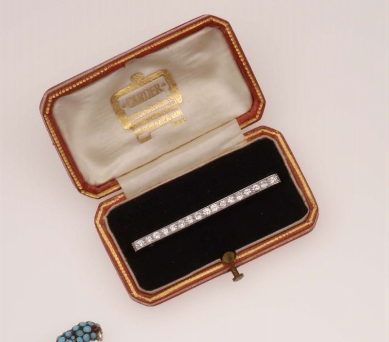 Diamond and platinum brooch. Signed and numbered Cartier Paris - New York 2031145. Fitted case  - Auction Fine Jewels - Cambi Casa d'Aste
