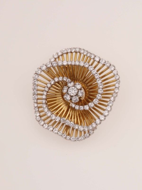 Brilliant-cut diamond and gold brooch. Signed Van Cleef & Arpels numbered 83773