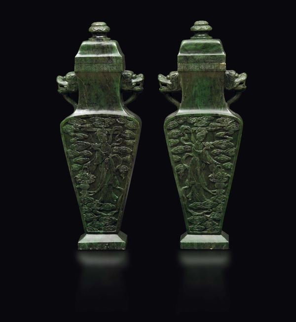 A pair of vases with lids in spinach jade depicting Guanyin, China, late 19th century