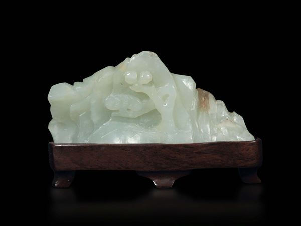 A small carved white jade mountain with blossoming trees, China, Qing Dynasty, 18th century