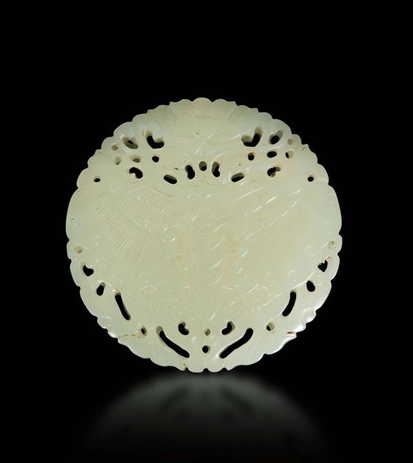 A white jade pendant with a butterflies decoration, China, Qing Dynasty, 19th century