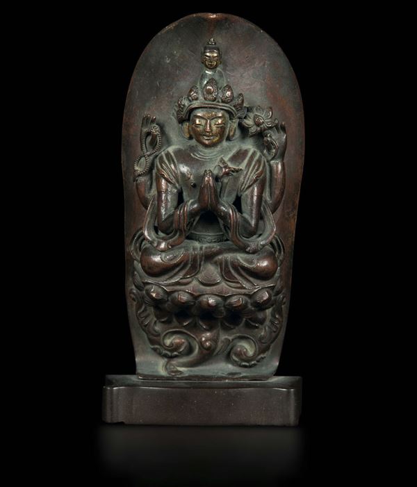 Placca in bronzo con Avalokitesvara seduto su fiore di loto, Tibet, XVII secolo