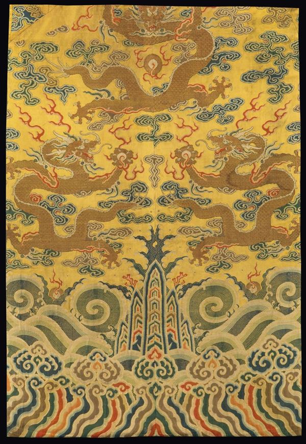Kesi with gold thread depictions of dragons among the clouds on a yellow backdrop, China, Qing Dynasty, Qianlong period (1736-1796)