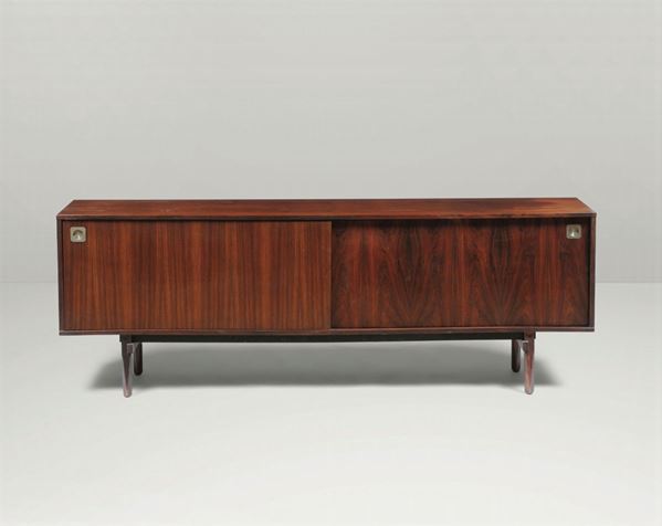 A wooden sideboard with chromed metal details. Italy, 1950 ca.