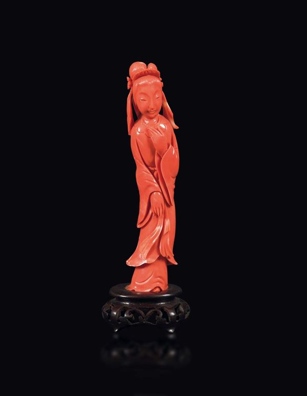 A small carved coral Guanyin, China, early 20th century