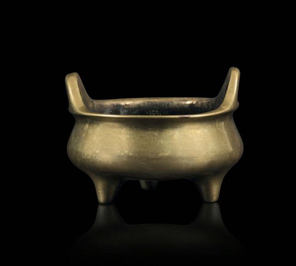 A tripodal bronze censer with handles, China, Qing dynasty, 19th century