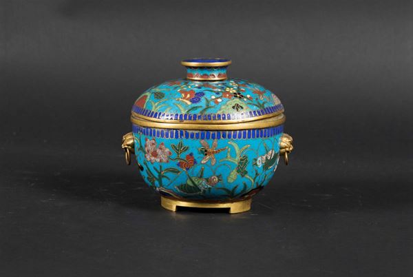 A small potiche with a cloisonné glazed lid with a floral decor and ring handles, China, Qing Dynasty, 19th century