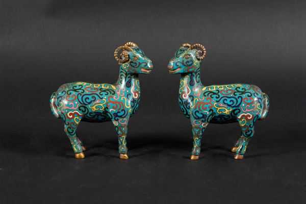 A pair of figures of rams in cloisonné enamels, China, early 20th century