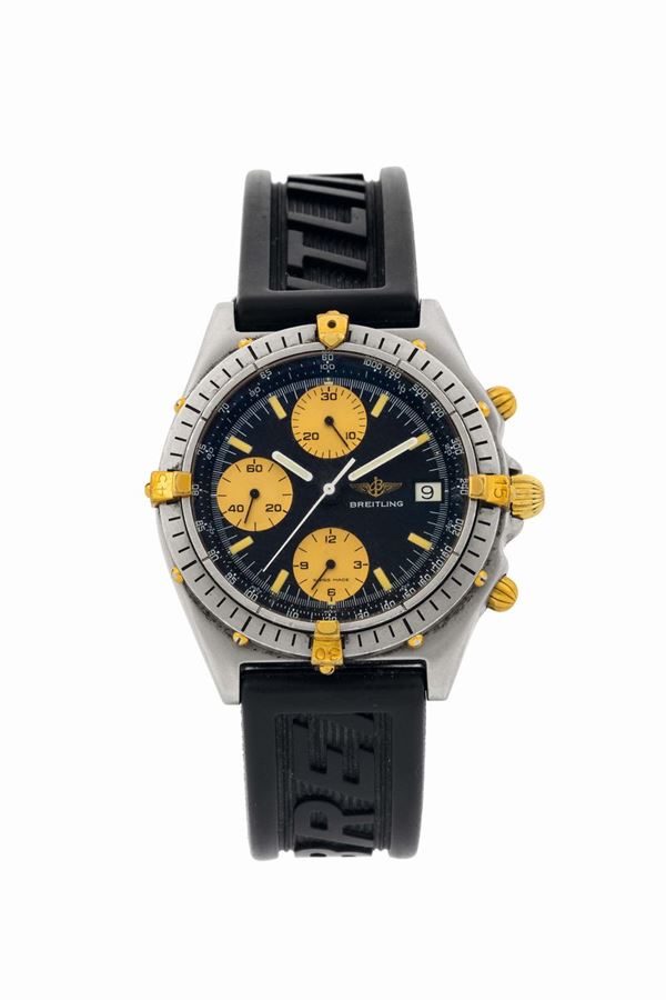 Breitling,  Chronomat Automatic,  Ref.81950. Fine, water-resistant, stainless steel and 18K yellow gold wristwatch with date, round button chronograph, registers, tachometer with original buckle. Made circa 1990