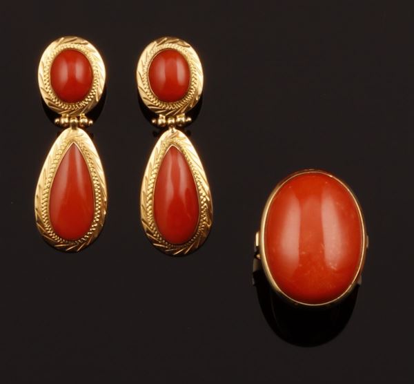 Coral and gold ring and a pair of earrings